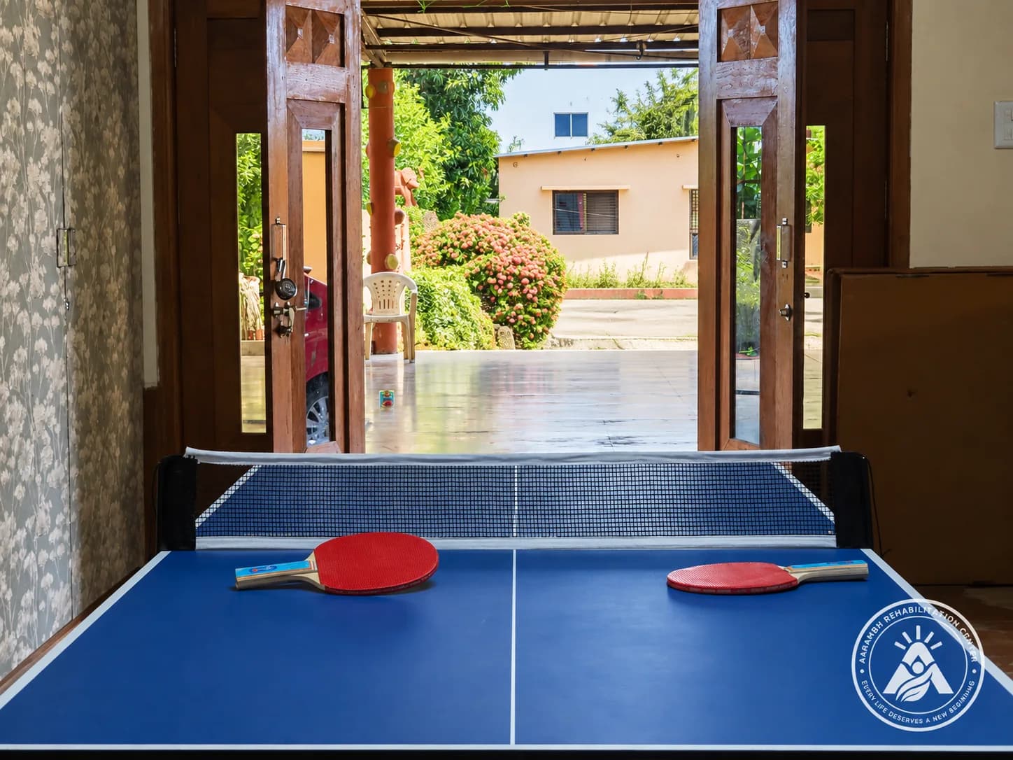 Table-tennis table in a shared area at Aarambh