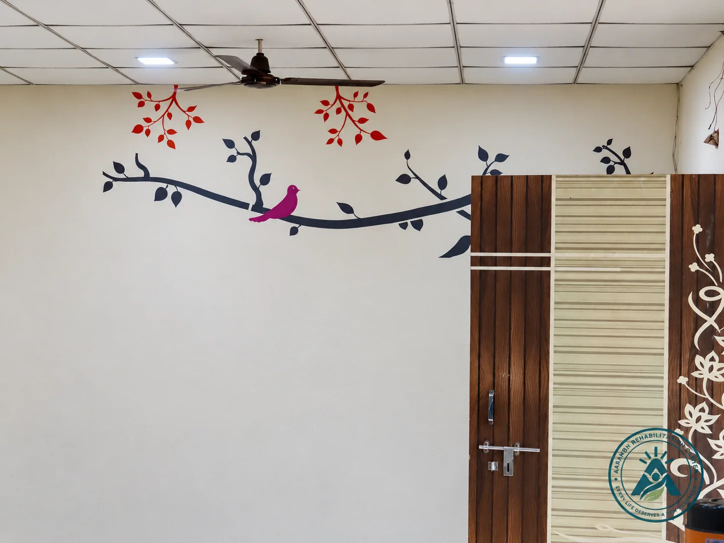 A painted welcome wall at Aarambh